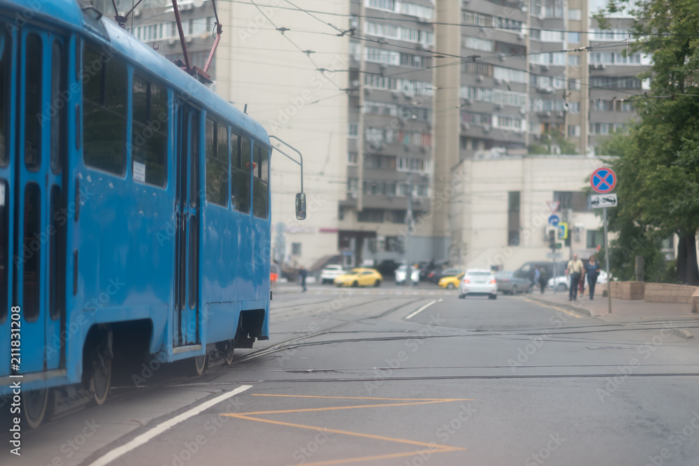 a blue tram ride down the Street in Moscow