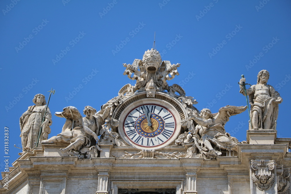 Clock at St. Peter's Basilica in the Vatican in Rome, Italy