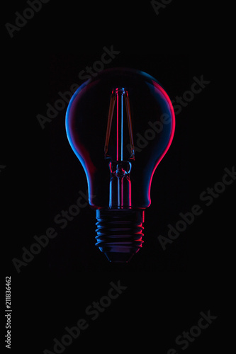 Ideas and innovation red and blue light bulb concept