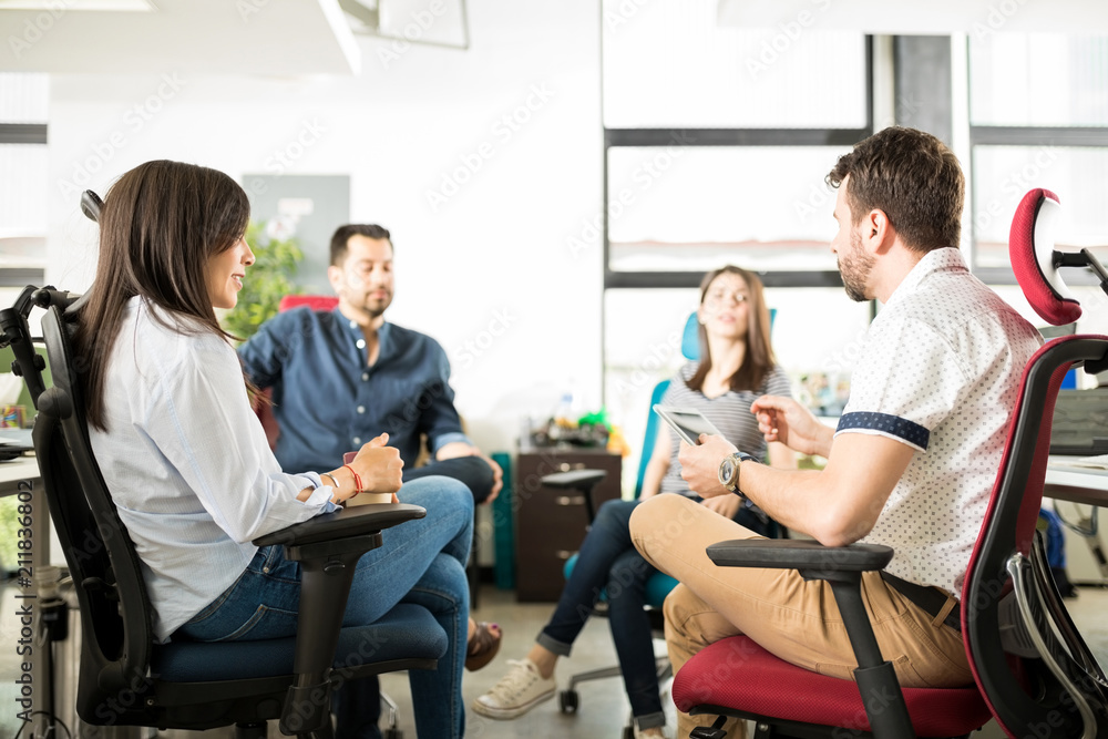 Executive having meeting in office Executive having meeting in office