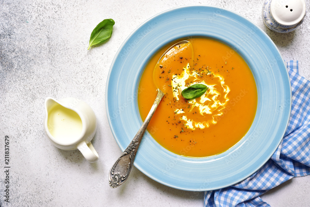 Delicious pumpkin soup.Top view with copy space. Delicious pumpkin soup.Top view with copy space.