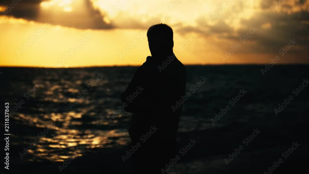 father and little son silhouettes play at sunset sky father and little son silhouettes play at sunset sky
