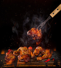 Stickers Grill / Barbecue Kippenpoten en vleugels op vlammengrill  © Lukas Gojda
