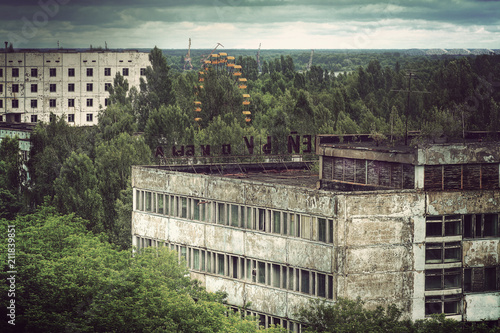 View of Prypiat abandoned town near Chernobyl (Ukraine) with fameous ferrris wheel 