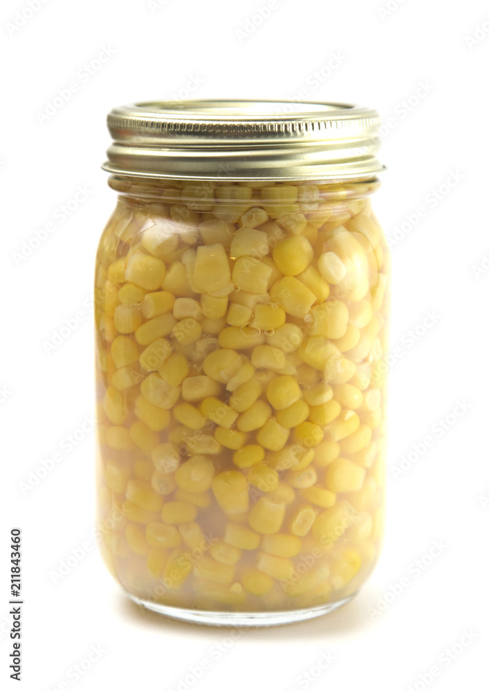 Corn on a White Background in a Home Canning Jar Corn on a White Background in a Home Canning Jar