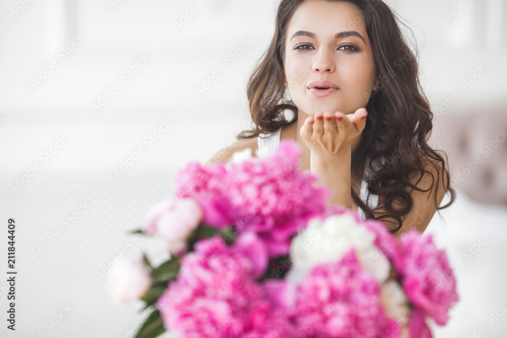 Young attractive woman with flowers Young attractive woman with flowers