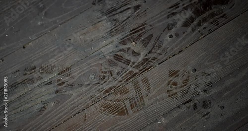 Floaty handheld rotating wood floor with dusty foot steps