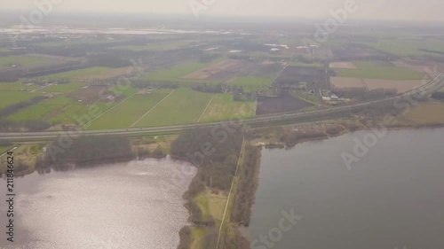 Flying over a dike between two lakes