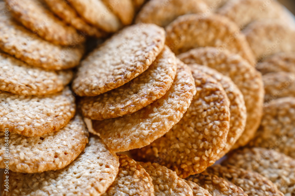 biscuits with sesame seeds. Delicious sweet confectionery. background, close-up, selective focus.