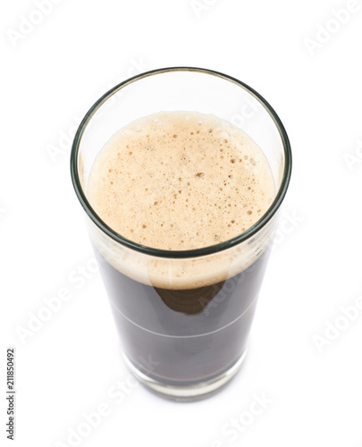 Glass of dark beer isolated