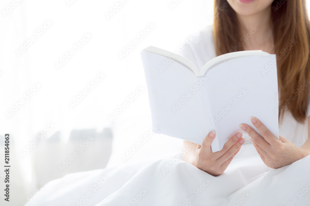 Beautiful of portrait young asian woman relax sitting reading book on bedroom at home, girl study literature, education and llifestyle concept. Beautiful of portrait young asian woman relax sitting reading book on bedroom at home, girl study literature, education and llifestyle concept.