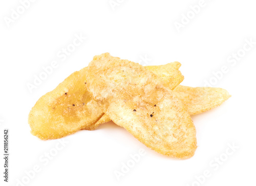 Pile of spiced banana chips isolated