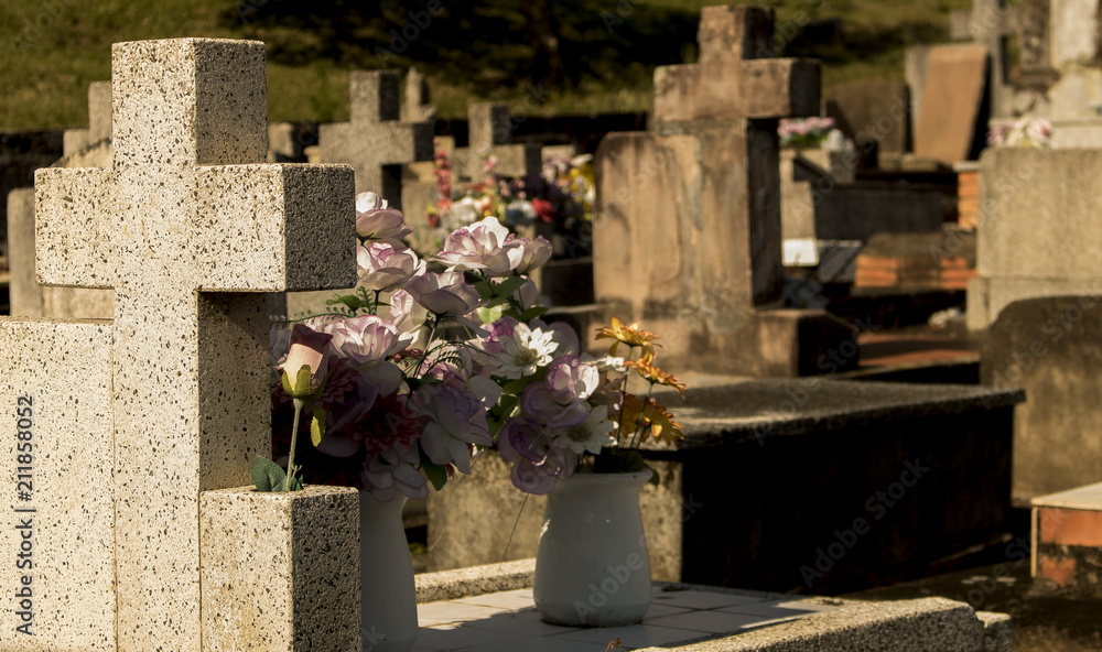 perception in the cemetery, flowers and crosses