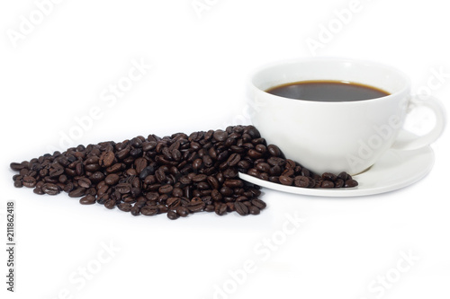 beverage concept of coffee beans heap with white cup and saucer . black and brown color seeds isolated white background . 
