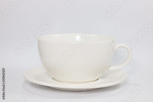 white glass cup coffee or tea for drinking , isolated