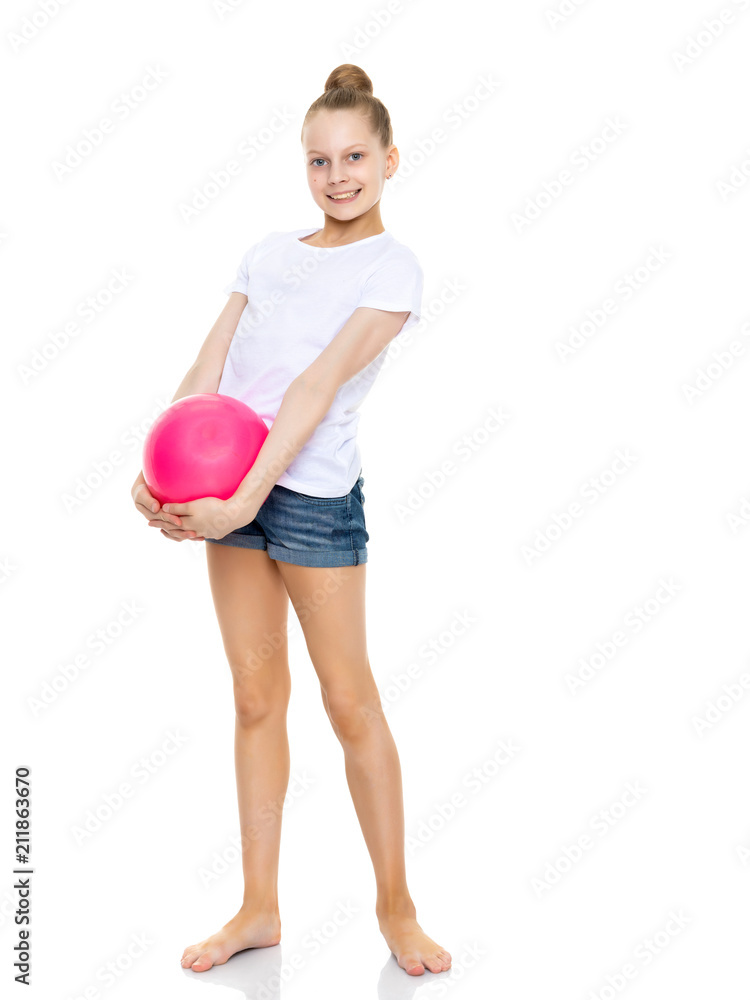 Girl gymnast performs exercises with the ball. Girl gymnast performs exercises with the ball.