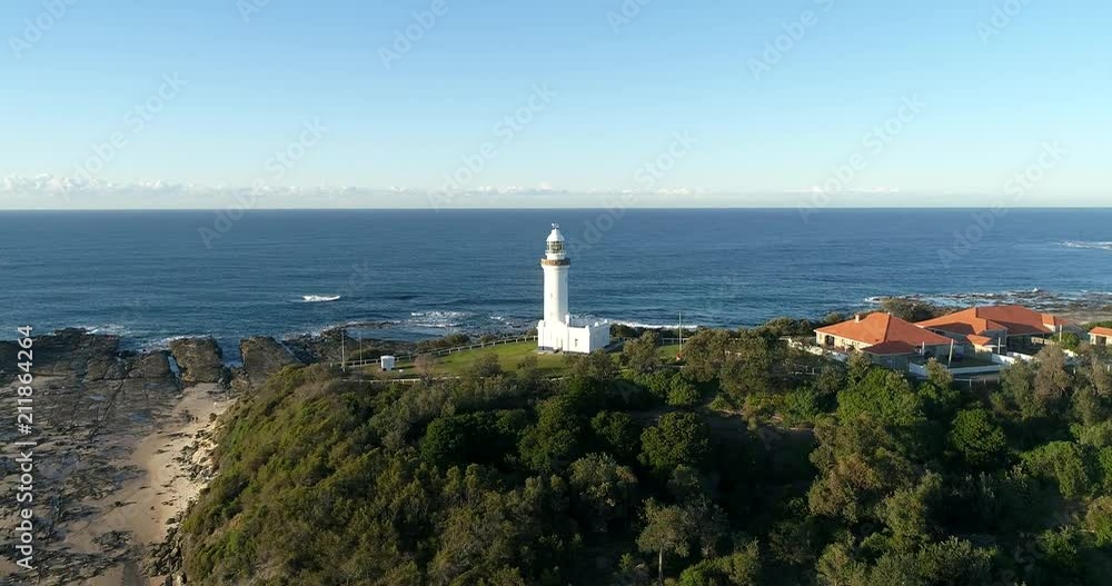 Panning around hill top of Norah Head with Norah lighthouse infrastructure and nature reserve with surfing seas of Pacific ocean.
Panning around hill top of Norah Head with Norah lighthouse infrastructure and nature reserve with surfing seas of Pacific ocean.