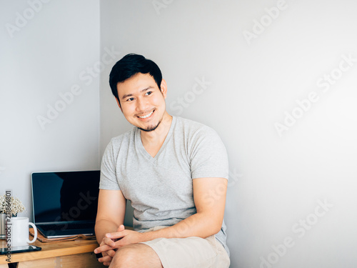 Man relax in his home office. © Sevendeman