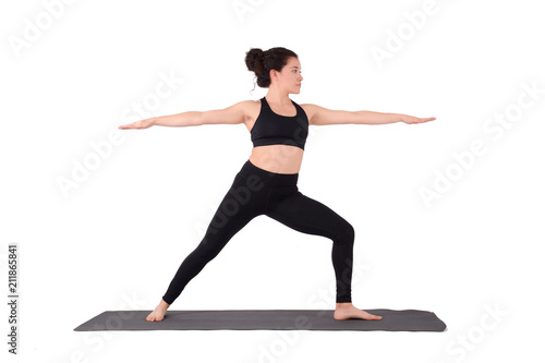 Young latin woman doing yoga pose.