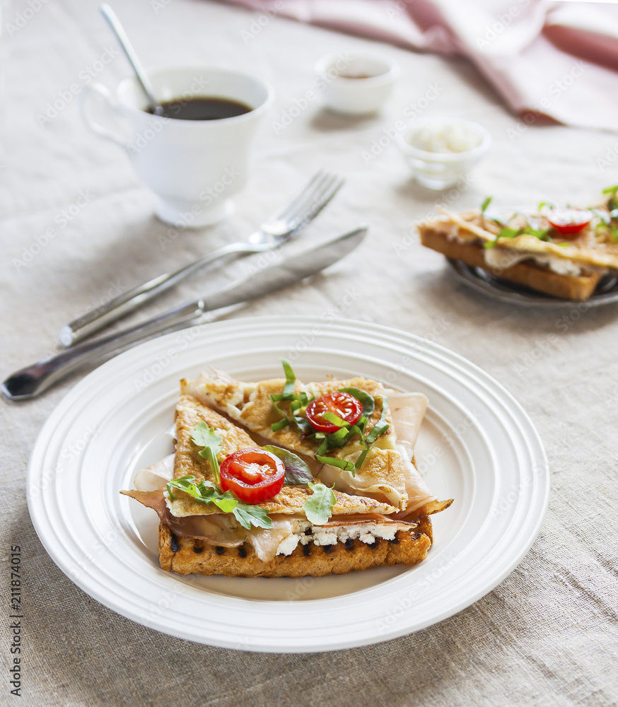Toasted English bacon & egg a white background Toasted English bacon & egg a white background