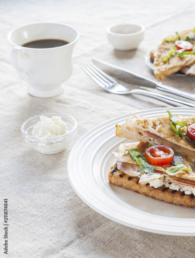 Toasted English bacon & egg a white background Toasted English bacon & egg a white background