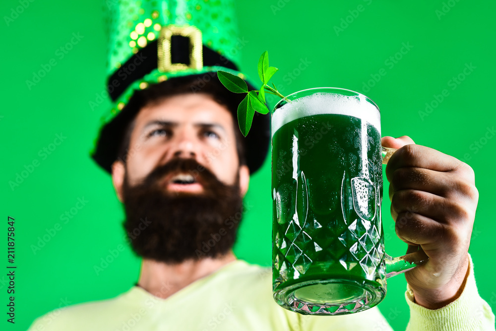 Green beer. Bearded leprechaun with green beer. Green men hat or top hat.  St Patricks Day. Ireland tradition. Happy four leafed clover. Selective  focus. Stock Photo | Adobe Stock