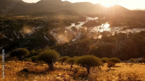 Sunrise in waterfall Epupa Falls, Northern Namibia photo