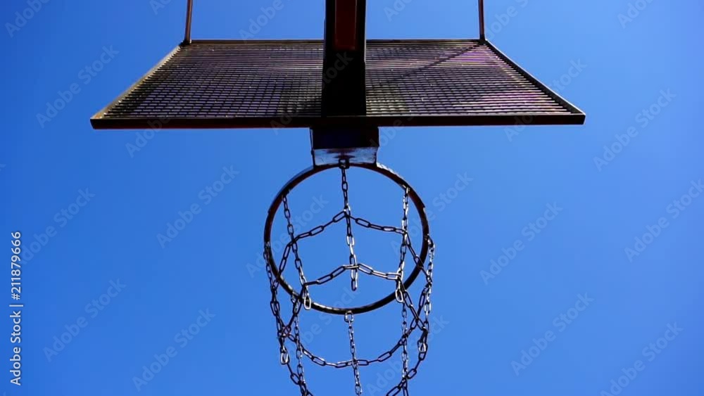 Basketball basket with chains on streetball court Basketball basket with chains on streetball court
