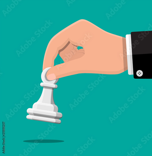 Businessman holding in hand pwan chess figure.