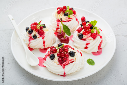 Pavlova meringue cake with fresh berries.