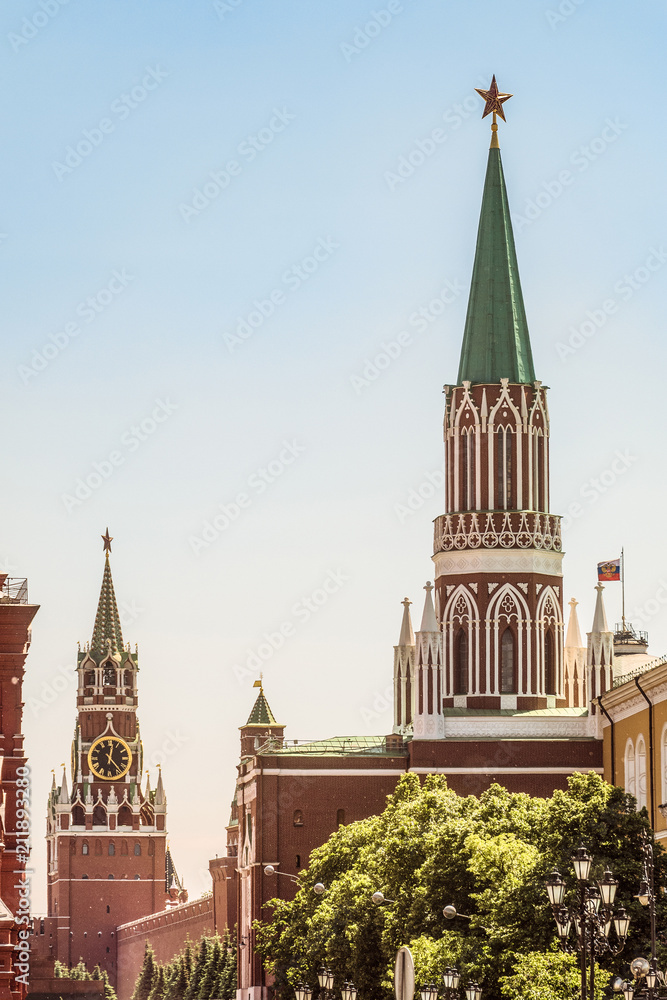 Center of the capital of Russia. Nikolskaya and Spasskaya towers in Moscow Kremlin on Red Square.