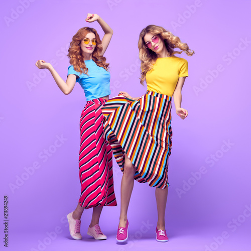 Two Girls Having Fun Dance. Fashion Summer Outfit