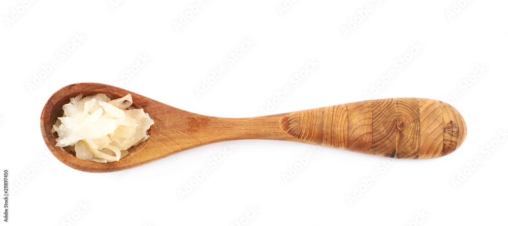 Wooden spoon of sauerkraut