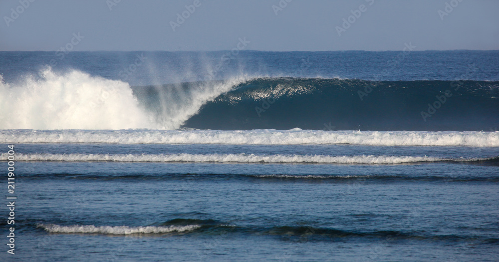 Powerful Surf - Sumatra Indonesia. This wave goes unridden down the coral reef in Sumatra. Indonesia is famous for its amazing surf. Powerful Surf - Sumatra Indonesia. This wave goes unridden down the coral reef in Sumatra. Indonesia is famous for its amazing surf.