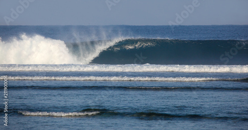 Powerful Surf - Sumatra Indonesia. This wave goes unridden down the coral reef in Sumatra. Indonesia is famous for its amazing surf.