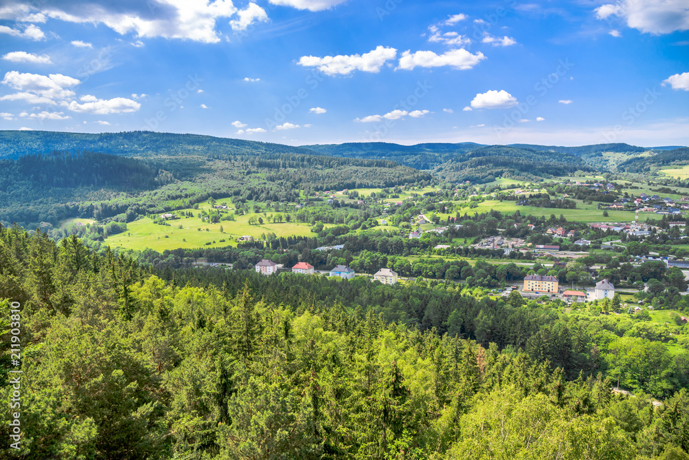 Green valley, town landscape and blue sky, Sudety in Poland
