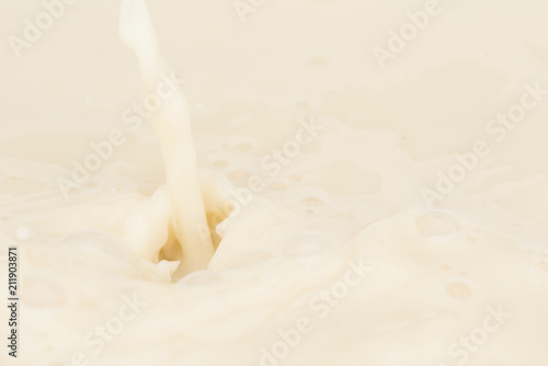 Pouring soy milk  food and drink background