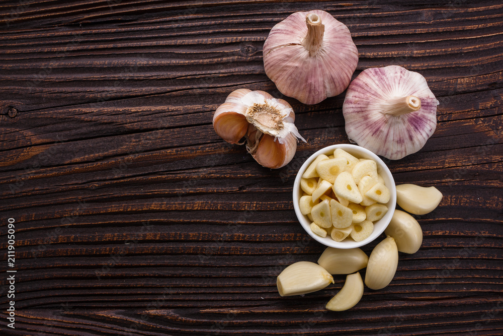 fragrant garlic on a wooden rustic background fragrant garlic on a wooden rustic background