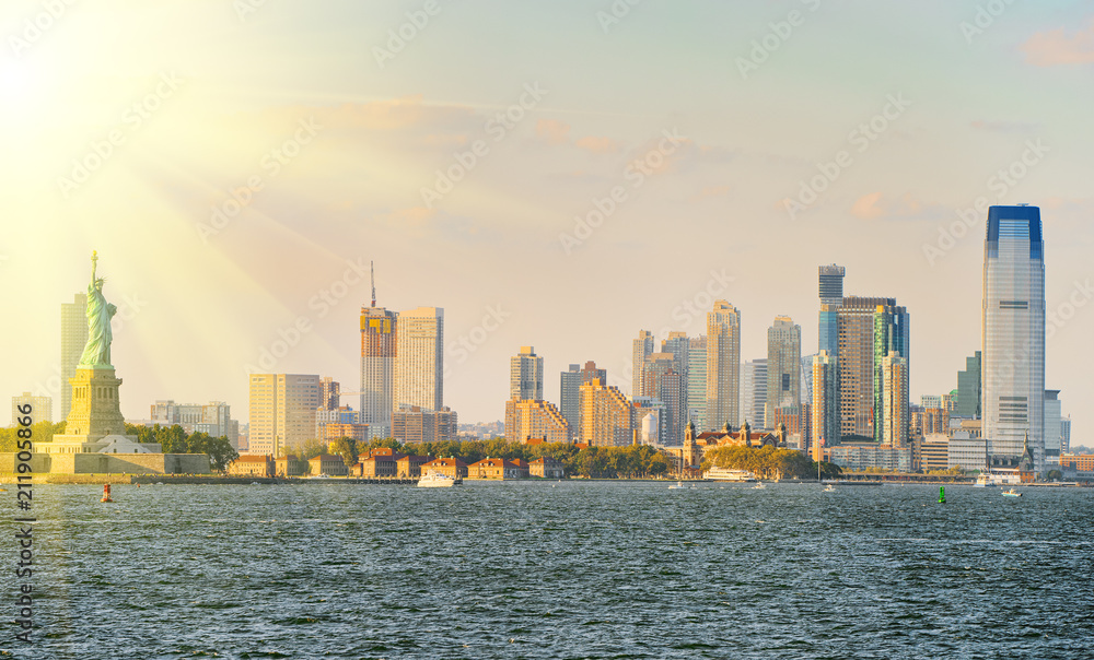 Skyline view of skyscrapers from water, from Hudson to the New Jersey city, opposite New York. Skyline view of skyscrapers from water, from Hudson to the New Jersey city, opposite New York.