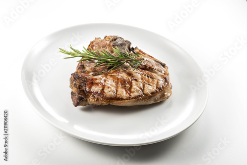 Grilled t-bone chop of pork
