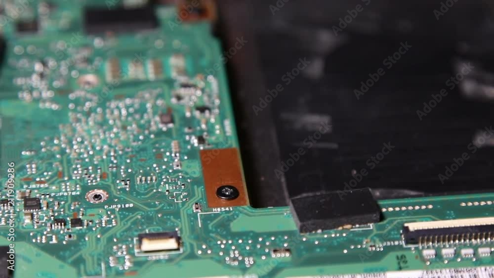 Computer circuit board close up, electronic technology background.
Electronic components on a computer board.
Computer circuit board close up, electronic technology background.
Electronic components on a computer board.