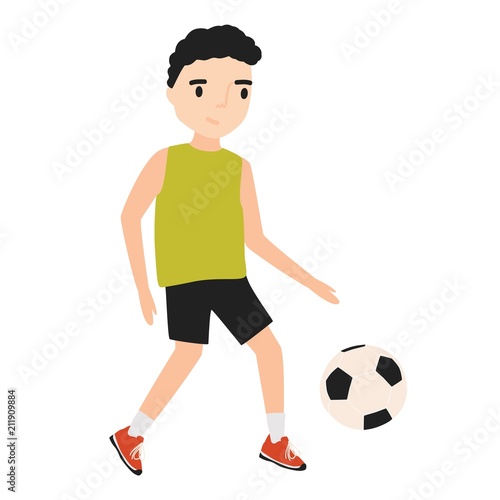 Funny little boy dressed in sportswear playing football or soccer isolated on white background