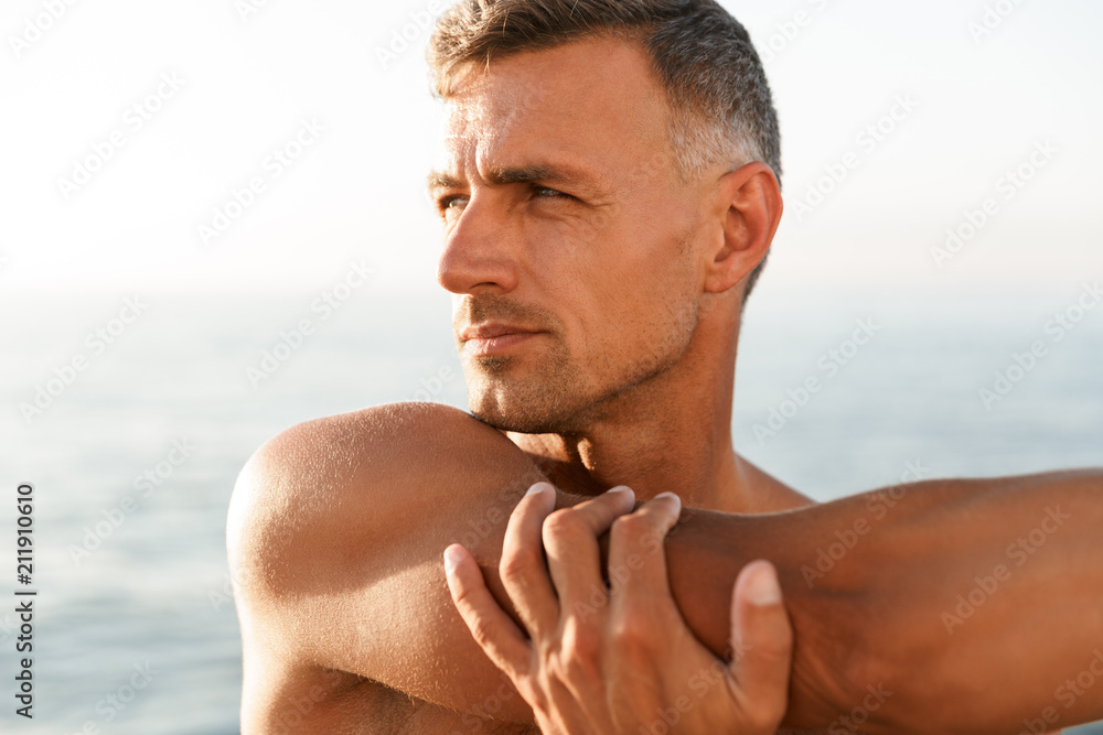 Close up of confident shirtless sportsman Close up of confident shirtless sportsman