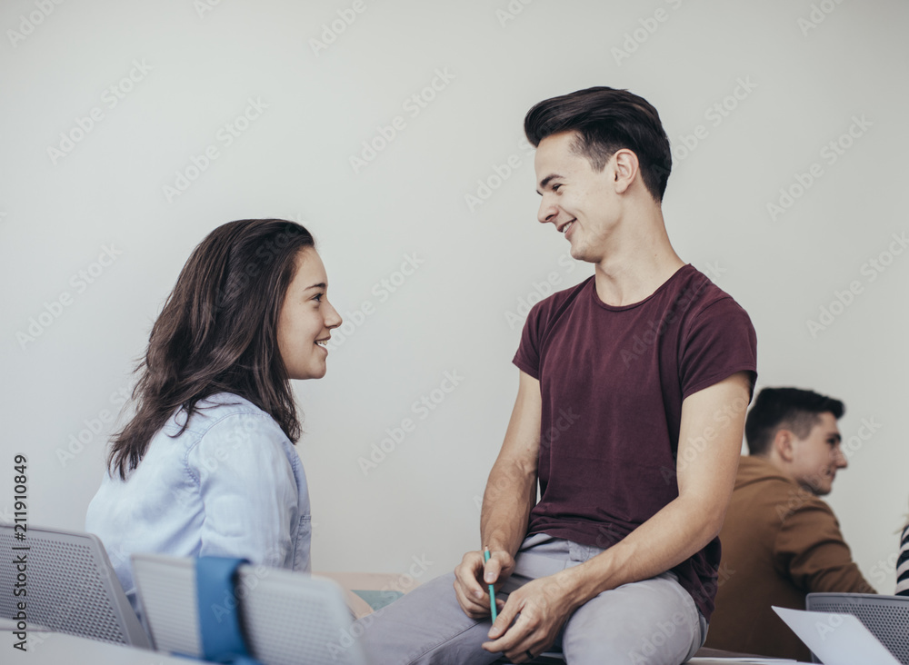 Teenagers Chatting at Classroom Teenagers Chatting at Classroom