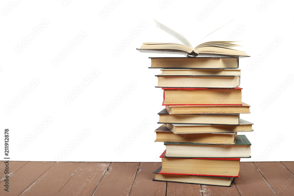 Science and education - group of red books open top on the wooden table Science and education - group of red books open top on the wooden table