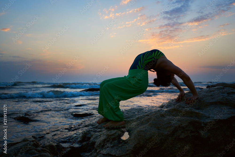 Premium AI Image | Sunset yoga on the beach with participants in meditative  poses