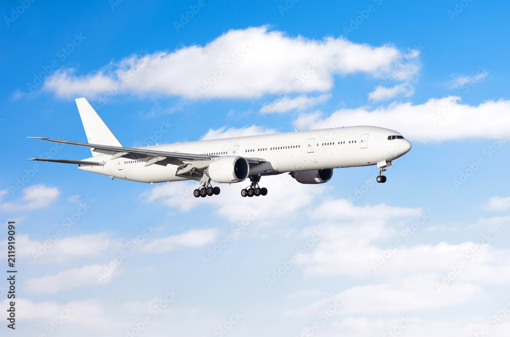 Commercial aircraft on approach before landing against the sky with clouds. Commercial aircraft on approach before landing against the sky with clouds.