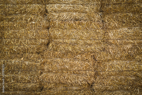 Texture of straw bales, background with vignette photo