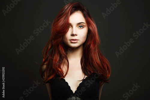 beautiful girl with healthy red color hair