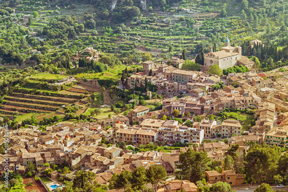 Valldemossa town in Majorca Balearic Islands. Beautiful aerial view of a stone houses village. Unesco world heritage traveling destination place.
